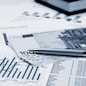 financial charts and graphs on the table