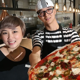 Money Fung, Supervisor and Jacky Hui, Senior Pizzaiolo at PizzaExpress in Tsim Sha Tsui. 19OCT16 SCMP / Dickson Lee (Photo by Dickson Lee/South China Morning Post via Getty Images)