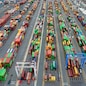 (FILES) This aerial view shows shipping containers stacked at the Port of Baltimore on April 10, 2025, in Baltimore, Maryland. US President Donald Trump ordered the reimposition of tariffs on dozens of trading partners on July 31, 2025 -- his cornerstone strategy for reshaping global trade to benefit the US economy. However in a minor reprieve, the White House said the measures will take effect in a week, not on August 1 as previously expected. (Photo by Jim WATSON / AFP)