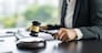 Lawyer businessman working with lawbook in office or courtroom Legal counsel with gavel and legal law. justice and lawyer concept Judge gavel hammer on Lawyer desk
