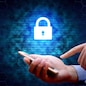 Cyber security concept. businessman using smartphone with lock network icon.