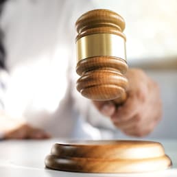 justice lawyer in a office , selected focus on hammer.