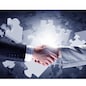 Close up of business handshake with puzzle elements at background