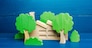 Industrial factory plant hidden behind the trees. Greenwashing concept. PR and trend about caring for environment. Misleading customers and buyers of products and maximizing profits. Hiding facts