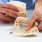 Man handling money.