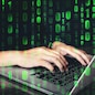 Hacker using keyboard typing bad data into computer online system and spreading to global stolen personal information. Cyber security concept