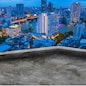 blank roof top of building with skyscraper landscape background