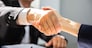 Close-up Of Businessperson's Hand Shaking With Partner