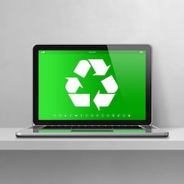 Laptop computer on a shelf with a recycling symbol on screen. environmental conservation concept. 3D illustration isolated on white background. Horizontal banner
