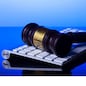 Wooden law gawel on computer keyboard, internet auction concept