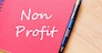 Red notepad and Non profit text concept