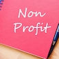 Red notepad and Non profit text concept