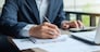 Businessman analysis maketing plan, Accountant calculate financial report, computer with graph chart.  Business, Finance and Accounting concepts
