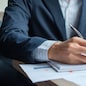 Businessman analysis maketing plan, Accountant calculate financial report, computer with graph chart.  Business, Finance and Accounting concepts