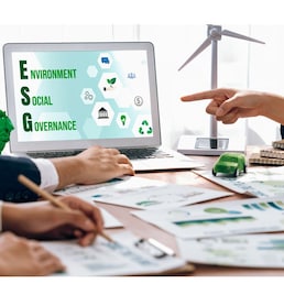 ESG environmental social governance display on laptop on eco-friendly company meeting with business people implementing environmental protection for clean and sustainable future ecology. Trailblazing