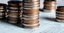 Pile of gold coins stack in finance treasury deposit bank account for saving . Concept of corporate business economy and financial growth by investment in valuable asset to gain cash revenue profit .