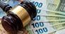 Judge's gavel on  euro bills background.  bribery or corruption concept