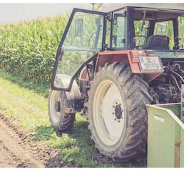 Tractor on an agriculture field, cut out