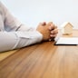 Real Estate agent showing a contract signature with customer to making a valuation deal