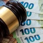 Judge's gavel on  euro bills background.  bribery or corruption concept