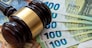 Judge's gavel on  euro bills background.  bribery or corruption concept