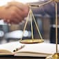 Handshake after good cooperation, Consultation between a male lawyer and businessman customer, tax and the company of real estate concept.