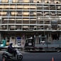 Construction workers work on scaffolding on a building site in Milan, Italy, on Monday, May 4, 2020. With Italy still in the throes of Europe's deadliest coronavirus outbreak, more than 4 million people are cleared to return to work on Monday. Photographer: Camilla Cerea/Bloomberg
