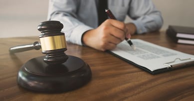 lawyer working with contract insurance.