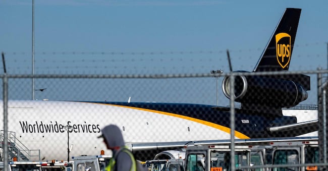 LOUISVILLE, KENTUCKY - NOVEMBER 5: A UPS MD-11 cargo plane sits idle on the tarmac on November 5, 2025 at Muhammad Ali International Airport in Louisville, Kentucky. The same type of plane crashed near the UPS facility at the airport shortly after take-off on November 4, killing at least nine people.   Michael Swensen/Getty Images/AFP (Photo by Michael Swensen / GETTY IMAGES NORTH AMERICA / Getty Images via AFP)