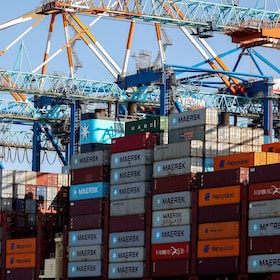 FILE PHOTO: Cranes unload Containers off the Maribo Maersk container ship at a terminal wharf in Bremerhaven, Germany, August 13, 2025. REUTERS/Leon Kuegeler/File Photo