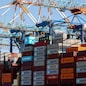FILE PHOTO: Cranes unload Containers off the Maribo Maersk container ship at a terminal wharf in Bremerhaven, Germany, August 13, 2025. REUTERS/Leon Kuegeler/File Photo