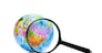 Globe under magnifying glass zooming Russia and China on white background