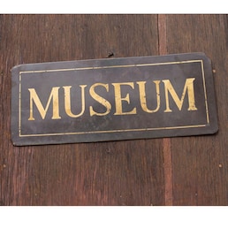 Entrance of an ancient museum, letters on original marble