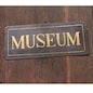 Entrance of an ancient museum, letters on original marble