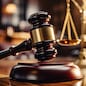 Close-up of gavel on judge desk, symbolizing court trial, justice and legal decisions in courtroom