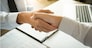 business negotiation in meeting hands shaking successful agreement