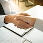 business negotiation in meeting hands shaking successful agreement