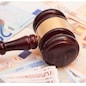Judge gavel and euro banknotes