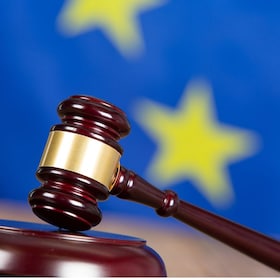 Judge hammer with European flag background