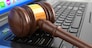 Online internet auction. Gavel on laptop.  3d