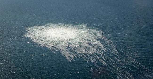 FILE PHOTO: Gas bubbles from the Nord Stream 2 leak reaching surface of the Baltic Sea in the area shows disturbance of well over one kilometre  diameter near Bornholm, Denmark, September 27, 2022.  Danish Defence Command/Handout via REUTERS/File Photo