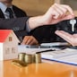 estate agent giving house keys customer sign agreement property for sale, Buying and selling homes concept