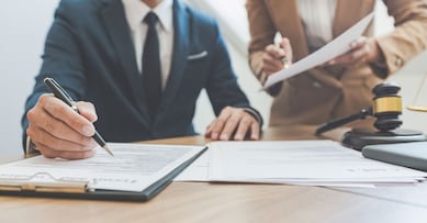 lawyer lawsuit notary consultation or discussing negotiation legal case with document contract women entrepreneurs in the office.