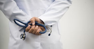 medical doctor with a stethoscope.