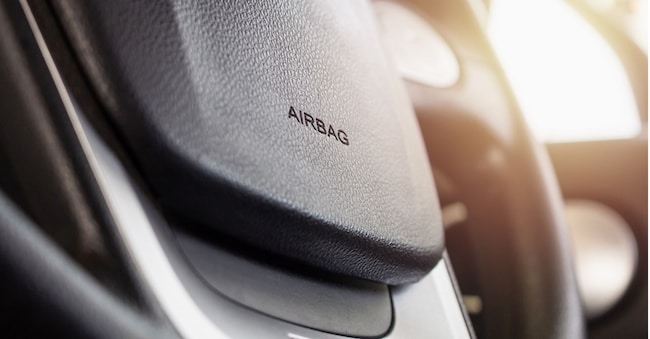 Safety airbag sign on car steering wheel