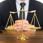gavel and soundblock of justice law and lawyer working on wooden desk background