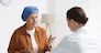 Senior woman with cancer visiting oncologist in clinic