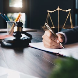 Judge gavel with Justice lawyers, Business woam in suit or lawyer working on a documents. Legal law, advice and justice concept.