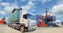 Truck with Industrial Container Cargo for Logistic Import Export at yard.