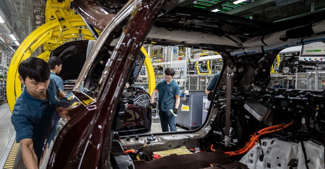 Operai sulla linea di produzione dei SUV Aito presso la Super Factory del Gruppo Seres Co. a Chongqing, Cina. (Fotografo: Qilai Shen/Bloomberg) 